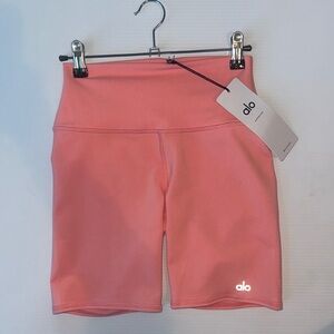 Alo yoga strawberry lemonade color in a high waisted biker short style